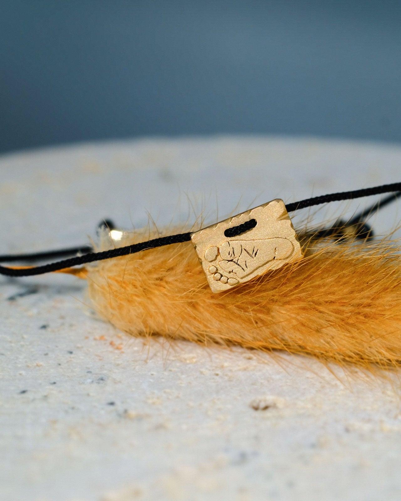 Footprint Roman Wristband