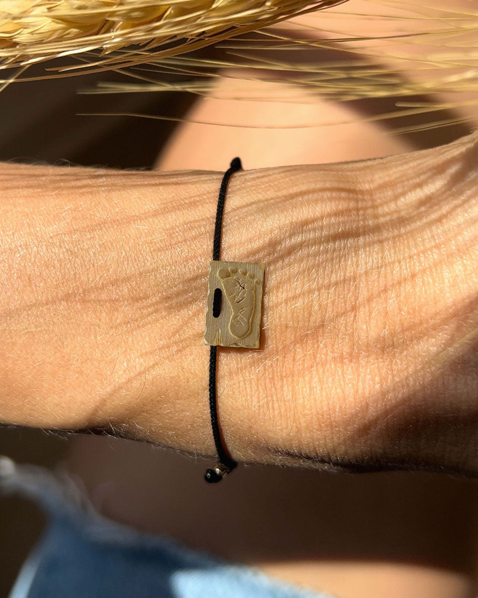 Footprint Roman Wristband