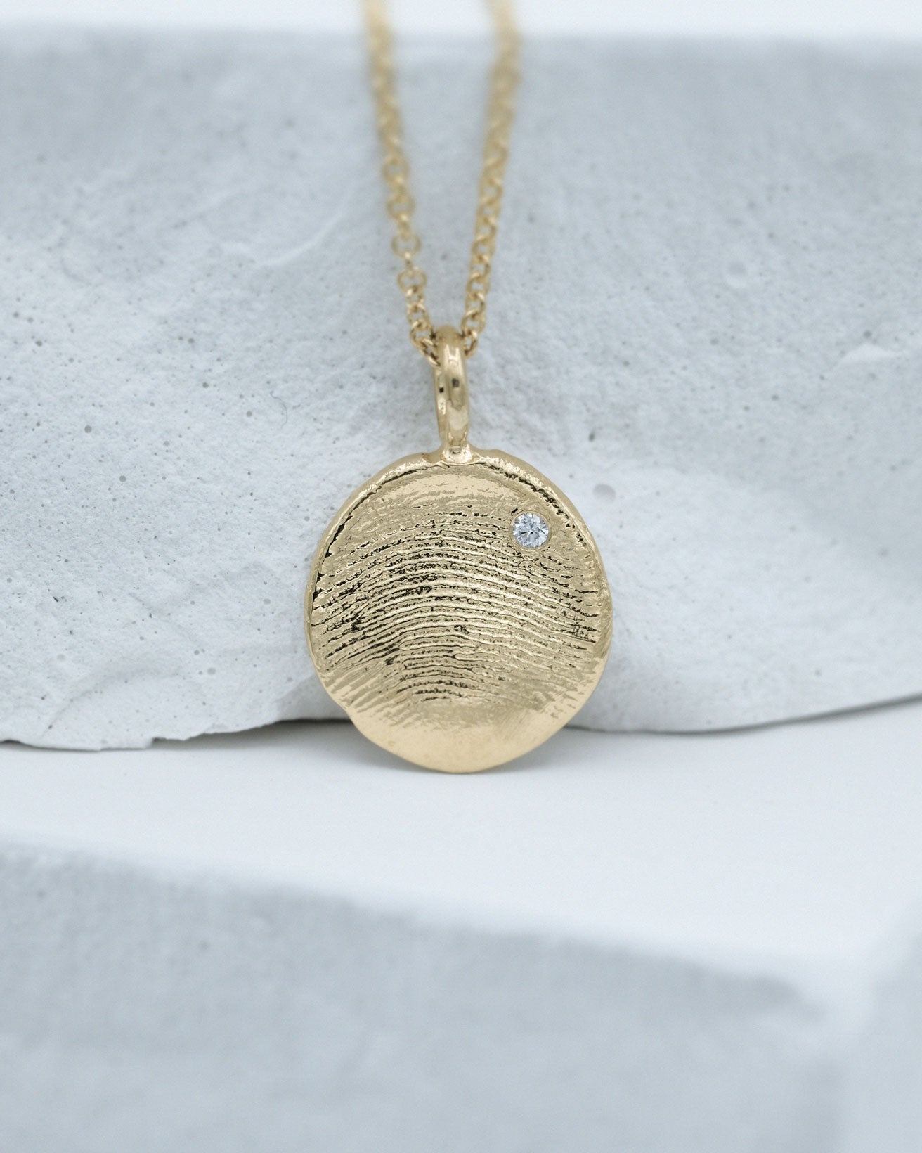 Fingerprint Necklace in solid gold on 1.5mm chain with a diamond