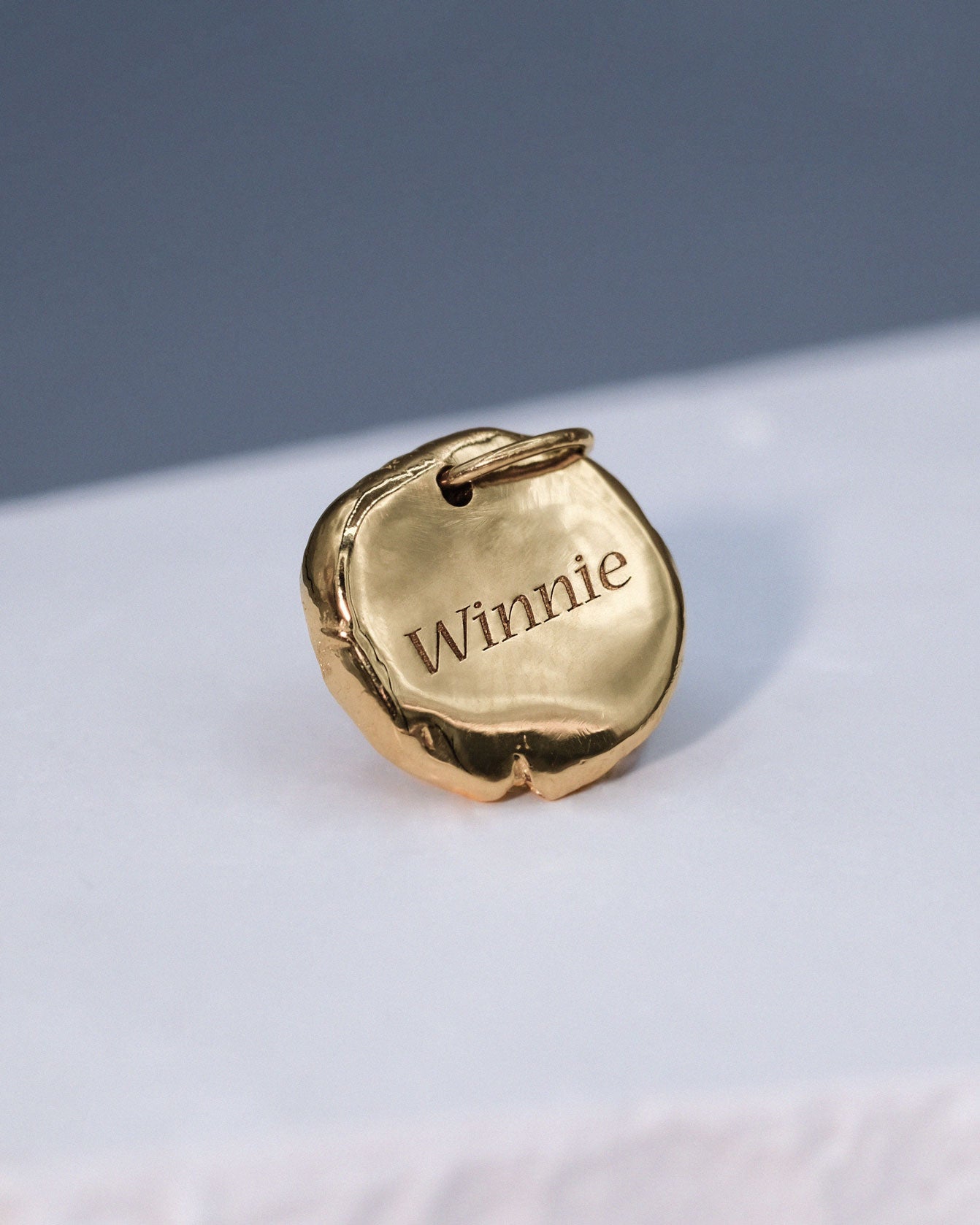 Mini Fingerprint Charm in solid gold with a diamond
