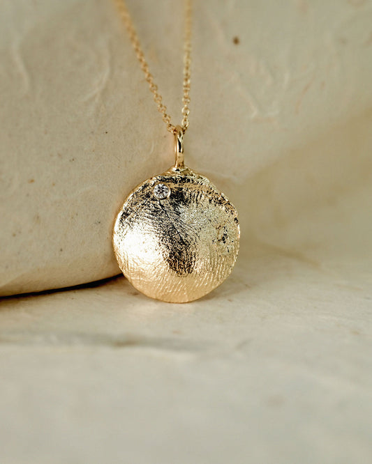Fingerprint Charm in solid gold with a diamond